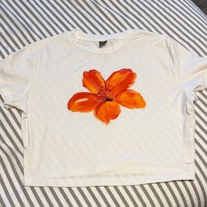 SHEIN White Tee with Orange Floral Design